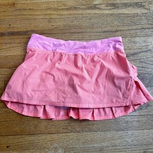 Orange Lululemon Striped Skirt with pink waistband